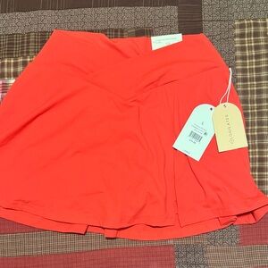 Logilates Spicy Orange Crisscross Slit Skort